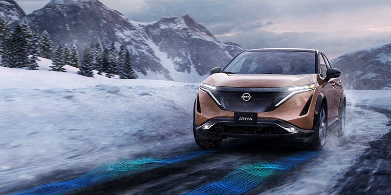 Nissan Ariya confidently navigating snowy terrain with intelligent all-wheel control